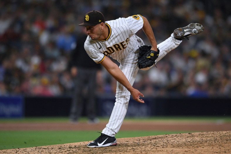 Jul 10, 2021; San Diego, California, USA; San Diego Padres relief pitcher James Norwood (67) throws a pitch against the Colorado Rockies during the eighth inning at Petco Park. Mandatory Credit: Orlando Ramirez-USA TODAY Sports