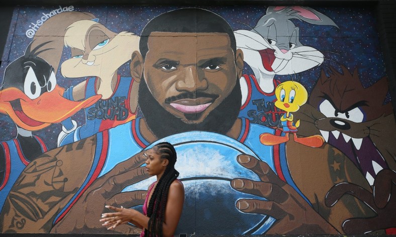 Chardae Slater, 24, a Kent State University art student, talks about painting the LeBron James "Space Jam" mural on West Market  and North Valley Street  on Wednesday July 21, 2021. The painting was Slater's first attempt at a mural.

Mural 1