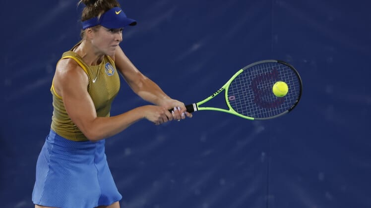 Jul 29, 2021; Tokyo, Japan; Elina Svitolina of Ukraine hits a backhand against Marketa Vondrousova of Czech Republic (not pictured) in a women's singles semifinal during the Tokyo 2020 Olympic Summer Games at Ariake Tennis Park. Mandatory Credit: Geoff Burke-USA TODAY Sports