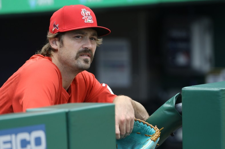 Aug 26, 2021; Pittsburgh, Pennsylvania, USA;  St. Louis Cardinals relief pitcher Andrew Miller (21) watches the Pittsburgh Pirates take batting practice before playing at PNC Park. Mandatory Credit: Charles LeClaire-USA TODAY Sports
