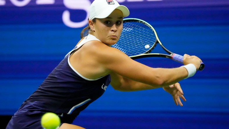 Sep 4, 2021; Flushing, NY, USA; 
Ashleigh Barty of Australia hits to Shelby Rogers of the USA on day six of the 2021 U.S. Open tennis tournament at USTA Billie Jean King National Tennis Center. Mandatory Credit: Robert Deutsch-USA TODAY Sports