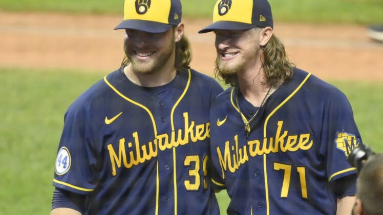 Sep 11, 2021; Cleveland, Ohio, USA; Milwaukee Brewers starting pitcher Corbin Burnes (39) and relief pitcher Josh Hader (71) pose for a picture after they threw a combined no-hitter in a win against the Cleveland Indians at Progressive Field. Mandatory Credit: David Richard-USA TODAY Sports