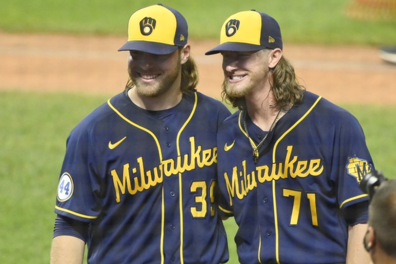Sep 11, 2021; Cleveland, Ohio, USA; Milwaukee Brewers starting pitcher Corbin Burnes (39) and relief pitcher Josh Hader (71) pose for a picture after they threw a combined no-hitter in a win against the Cleveland Indians at Progressive Field. Mandatory Credit: David Richard-USA TODAY Sports