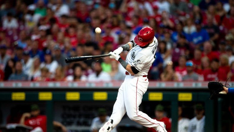 Cincinnati Reds center fielder Jesse Winker (33) breaks his bat on contact in the first inning of the MLB baseball game between Cincinnati Reds and Los Angeles Dodgers on Friday, Sept. 17, 2021, at Great American Ball Park in Cincinnati.

Cincinnati Reds Los Angeles Dodgers