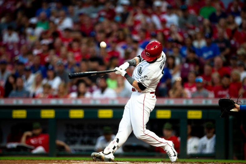 Cincinnati Reds center fielder Jesse Winker (33) breaks his bat on contact in the first inning of the MLB baseball game between Cincinnati Reds and Los Angeles Dodgers on Friday, Sept. 17, 2021, at Great American Ball Park in Cincinnati.

Cincinnati Reds Los Angeles Dodgers