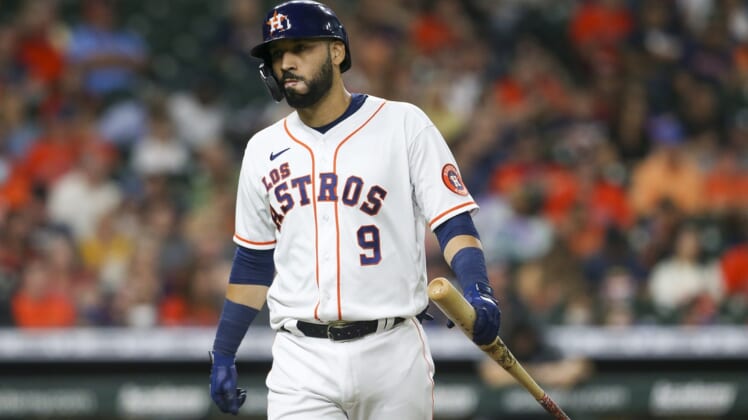 Sep 18, 2021; Houston, Texas, USA; Houston Astros designated hitter Marwin Gonzalez (9) reacts after hitting a line drive for the final out of the inning with men in scoring position against the Arizona Diamondbacks in the fourth inning at Minute Maid Park. Mandatory Credit: Thomas Shea-USA TODAY Sports