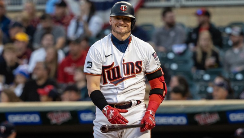 Sep 23, 2021; Minneapolis, Minnesota, USA; Minnesota Twins third baseman Josh Donaldson (20) reacts while batting during the first inning against the Toronto Blue Jays at Target Field. Mandatory Credit: Jordan Johnson-USA TODAY Sports