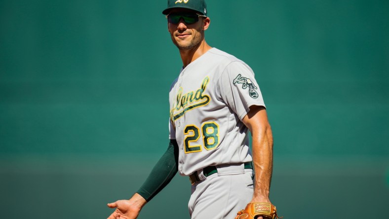 Sep 16, 2021; Kansas City, Missouri, USA; Oakland Athletics first baseman Matt Olson (28) reacts during the third inning against the Kansas City Royals at Kauffman Stadium. Mandatory Credit: Jay Biggerstaff-USA TODAY Sports