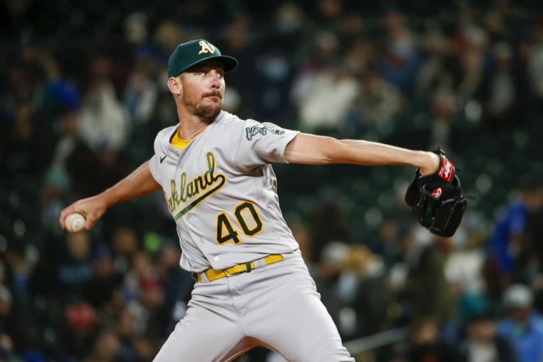 Sep 28, 2021; Seattle, Washington, USA; Oakland Athletics starting pitcher Chris Bassitt (40) throws against the Seattle Mariners during the third inning at T-Mobile Park. Mandatory Credit: Joe Nicholson-USA TODAY Sports