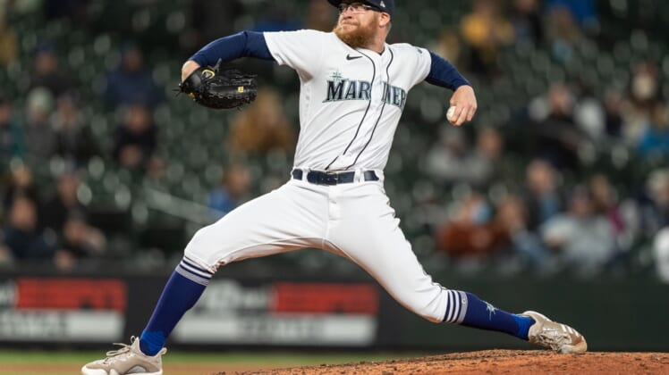Sep 27, 2021; Seattle, Washington, USA;  Seattle Mariners reliever Sean Doolittle (62) delivers a pitch against the Oakland Athletics at T-Mobile Park. The Mariners won 13-4. Mandatory Credit: Stephen Brashear-USA TODAY Sports