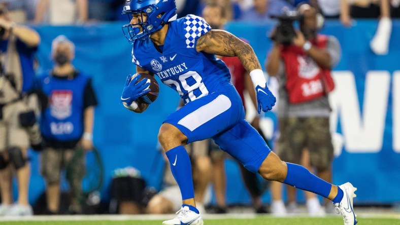 Oct 2, 2021; Lexington, Kentucky, USA; Kentucky Wildcats wide receiver Rahsaan Lewis (28) carries the ball down the field during the second quarter against the Florida Gators at Kroger Field. Mandatory Credit: Jordan Prather-USA TODAY Sports