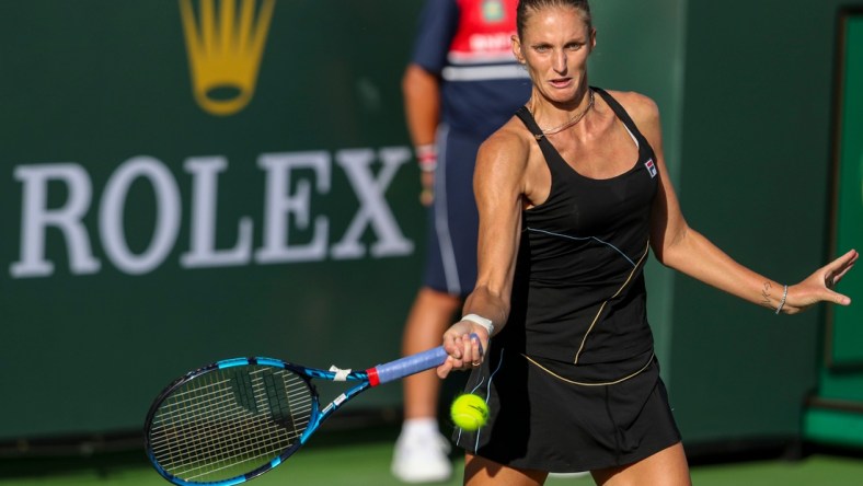 Karolina Pliskova of Czechia returns the ball to Beatriz Haddad Maia of Brazil during their round three match of the BNP Paribas Open, Monday, Oct. 11, 2021, in Indian Wells, Calif.