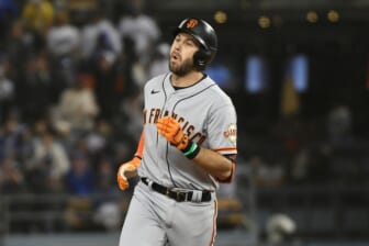 Oct 11, 2021; Los Angeles, California, USA; San Francisco Giants third baseman Evan Longoria (10) celebrates after hitting a solo home run against the Los Angeles Dodgers in the fifth inning during game three of the 2021 NLDS at Dodger Stadium. Mandatory Credit: Richard Mackson-USA TODAY Sports