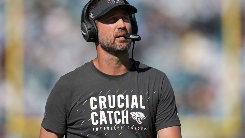 Oct 10, 2021; Jacksonville, Florida, USA; Jacksonville Jaguars passing game coordinator Brian Schottenheimer walks down the sideline during the second half against the Tennessee Titans at TIAA Bank Field. Mandatory Credit: Jasen Vinlove-USA TODAY Sports