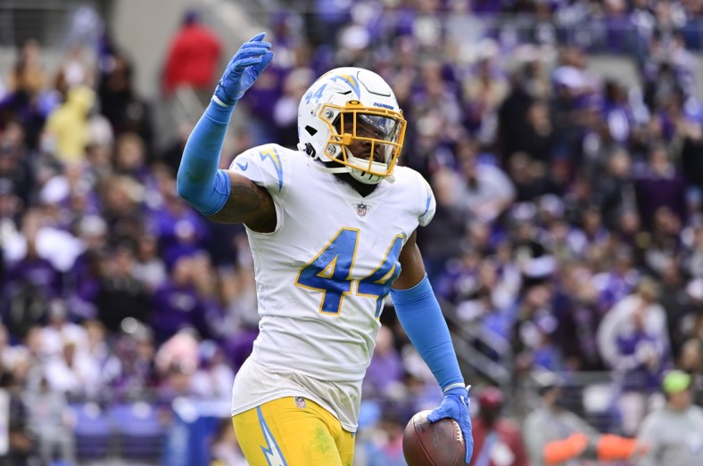 Oct 17, 2021; Baltimore, Maryland, USA; Los Angeles Chargers outside linebacker Kyzir White (44) reacts after intercepting Baltimore Ravens quarterback Lamar Jackson (8)  during the first half at M&T Bank Stadium. Mandatory Credit: Tommy Gilligan-USA TODAY Sports