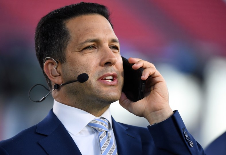 Oct 18, 2021; Nashville, Tennessee, USA; ESPN NFL Insider Adam Schefter talks on his phone before the Monday Night Football game between the Tennessee Titans and the Buffalo Bills at Nissan Stadium. Mandatory Credit: Christopher Hanewinckel-USA TODAY Sports