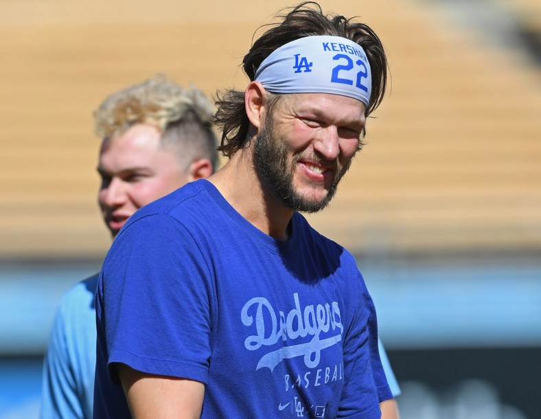 Oct 20, 2021; Los Angeles, California, USA; Los Angeles Dodgers starting pitcher Clayton Kershaw (22) looks on as he works out before game four of the 2021 NLCS against the Atlanta Braves at Dodger Stadium. Mandatory Credit: Jayne Kamin-Oncea-USA TODAY Sports