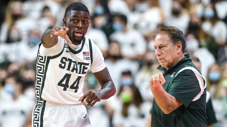 Michigan State's Gabe Brown, left, talks with head coach Tom Izzo during the first half in the game against Ferris State on Wednesday, Oct. 27, 2021, at the Breslin Center in East Lansing.211027 Msu Ferris 020a