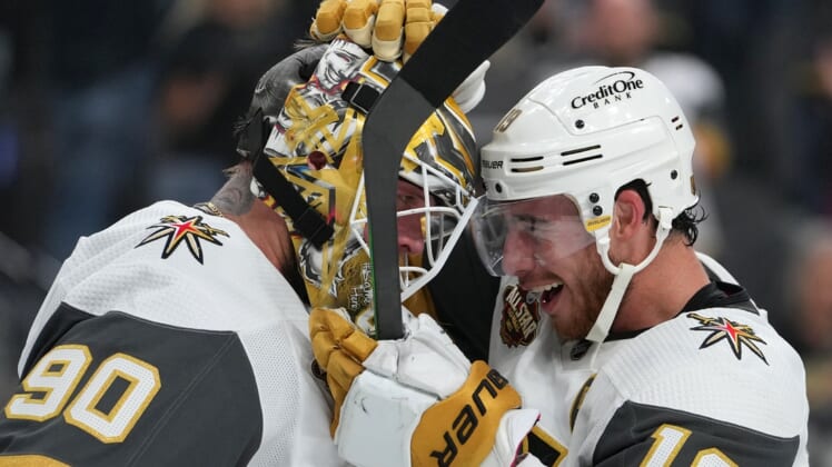 Oct 29, 2021; Las Vegas, Nevada, USA; Vegas Golden Knights right wing Reilly Smith (19) congratulates Vegas Golden Knights goaltender Robin Lehner (90) after the Golden Knights defeated the Anaheim Ducks 5-4 in a shootout at T-Mobile Arena. Mandatory Credit: Stephen R. Sylvanie-USA TODAY Sports