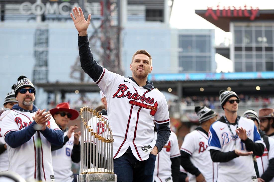 Nov 5, 2021; Atlanta, GA, USA; Atlanta Braves first baseman Freddie Freeman waves to the crowd during the World Series championship rally at Truist Park. Mandatory Credit: Brett Davis-USA TODAY Sports