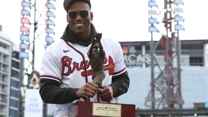 Nov 5, 2021; Atlanta, GA, USA; Atlanta Braves outfielder Jorge Soler holds the MVP trophy during the World Series championship rally at Truist Park. Mandatory Credit: Brett Davis-USA TODAY Sports