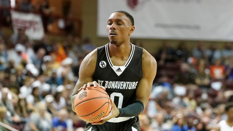 Nov 18, 2021; Charleston, South Carolina, USA; St. Bonaventure Bonnies guard Kyle Lofton (0) shoots the second of two technical foul shots against the Boise State Broncos at TD Arena. Mandatory Credit: David Yeazell-USA TODAY Sports