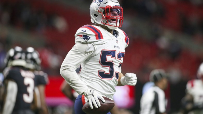 Nov 18, 2021; Atlanta, Georgia, USA; New England Patriots linebacker Kyle Van Noy (53) celebrates after an interception for a touchdown against the Atlanta Falcons in the second half at Mercedes-Benz Stadium. Mandatory Credit: Brett Davis-USA TODAY Sports