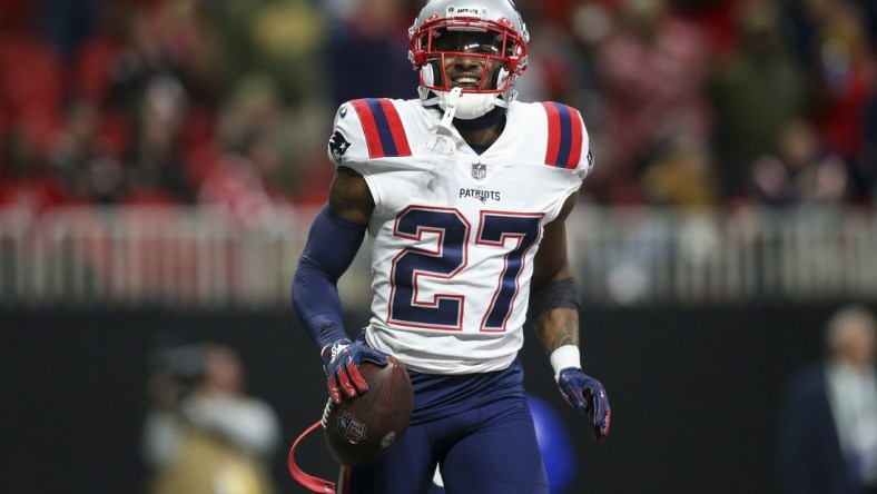 Nov 18, 2021; Atlanta, Georgia, USA; New England Patriots cornerback J.C. Jackson (27) celebrates after an interception against the Atlanta Falcons in the second half at Mercedes-Benz Stadium. Mandatory Credit: Brett Davis-USA TODAY Sports