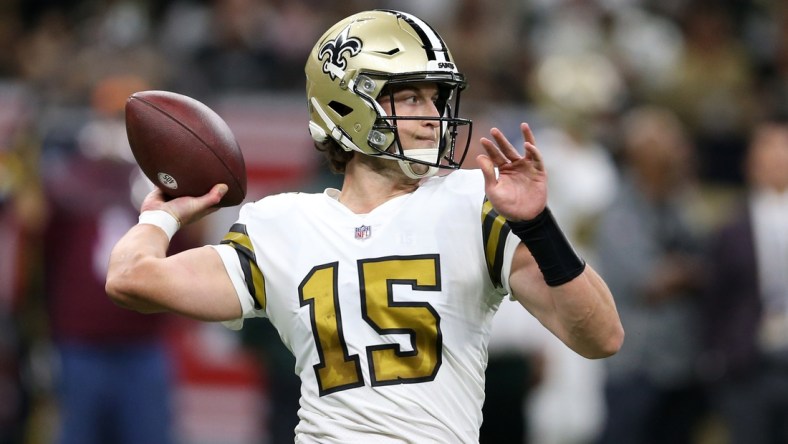 Nov 25, 2021; New Orleans, Louisiana, USA; New Orleans Saints quarterback Trevor Siemian (15) looks to throw in the second quarter against the Buffalo Bills at the Caesars Superdome. Mandatory Credit: Chuck Cook-USA TODAY Sports