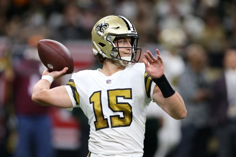 Nov 25, 2021; New Orleans, Louisiana, USA; New Orleans Saints quarterback Trevor Siemian (15) looks to throw in the second quarter against the Buffalo Bills at the Caesars Superdome. Mandatory Credit: Chuck Cook-USA TODAY Sports