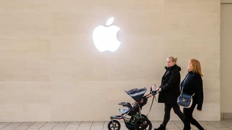 Two women walk under the Apple logo while shopping at Oxmoor Mall in Louisville, Kentucky on Black Friday. Nov 26, 2021

Aj4t9207