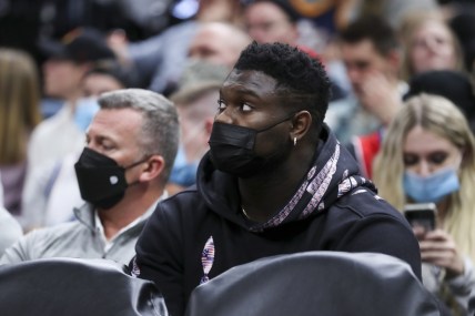 Nov 27, 2021; Salt Lake City, Utah, USA; New Orleans Pelicans forward Zion Williamson (1) watches from the bench in street clothes as his team plays the Utah Jazz at Vivint Arena. Mandatory Credit: Rob Gray-USA TODAY Sports