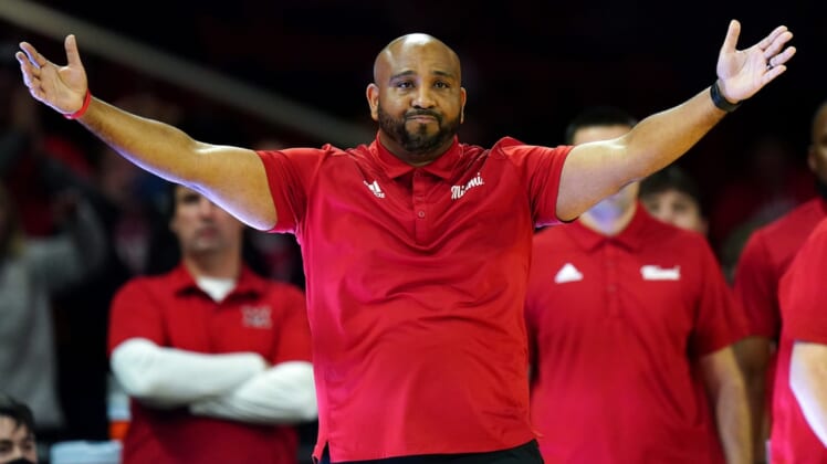 Miami (Oh) Redhawks head coach Jack Owens pumps up the crowd during free throws in the second half of an NCAA mens college basketball game, Wednesday, Dec. 1, 2021, at Millett Hall in Oxford, Ohio. The Cincinnati Bearcats won, 59-58.Cincinnati Bearcats At Miami Oh Redhawks Dec 1