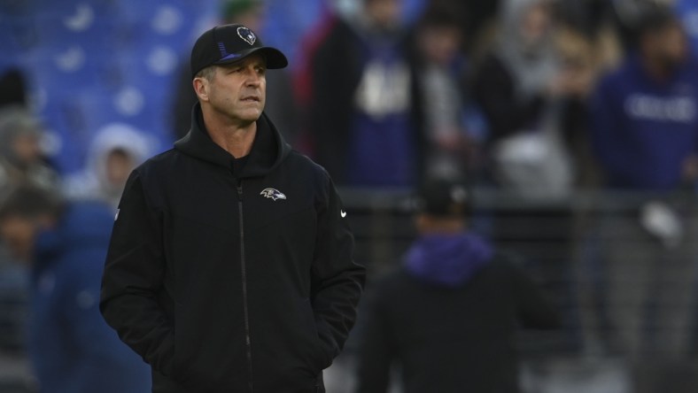 Dec 19, 2021; Baltimore, Maryland, USA;  Baltimore Ravens head coach John Harbaugh on the walks the field before the game against the Green Bay Packers at M&T Bank Stadium. Mandatory Credit: Tommy Gilligan-USA TODAY Sports