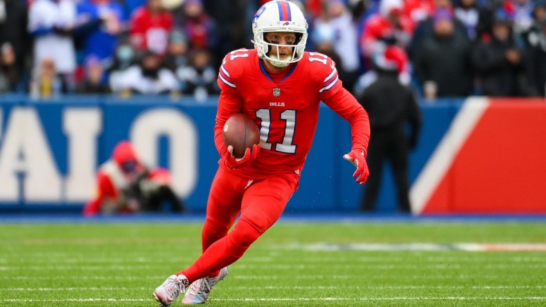 Dec 19, 2021; Orchard Park, New York, USA; Buffalo Bills wide receiver Cole Beasley (11) runs with the ball after a catch against the Carolina Panthers during the first half at Highmark Stadium. Mandatory Credit: Rich Barnes-USA TODAY Sports