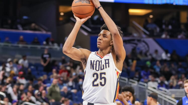 Dec 23, 2021; Orlando, Florida, USA; New Orleans Pelicans guard Trey Murphy III (25) shoots a free throw during the second half against the Orlando Magic at Amway Center. Mandatory Credit: Mike Watters-USA TODAY Sports