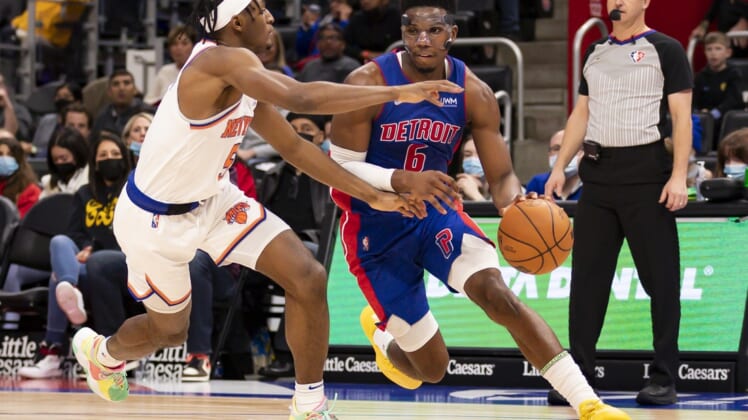 Dec 29, 2021; Detroit, Michigan, USA; Detroit Pistons guard Hamidou Diallo (6) drives to the basket against New York Knicks guard Immanuel Quickley (5) during the third quarter at Little Caesars Arena. Mandatory Credit: Raj Mehta-USA TODAY Sports