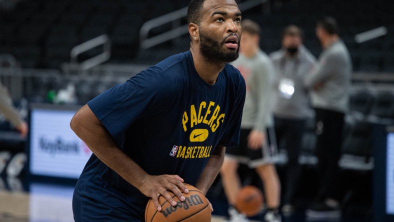 Dec 31, 2021; Indianapolis, Indiana, USA; Indiana Pacers forward T.J. Warren (1) shoots free throws before the game against the Chicago Bulls at Gainbridge Fieldhouse. Mandatory Credit: Trevor Ruszkowski-USA TODAY Sports