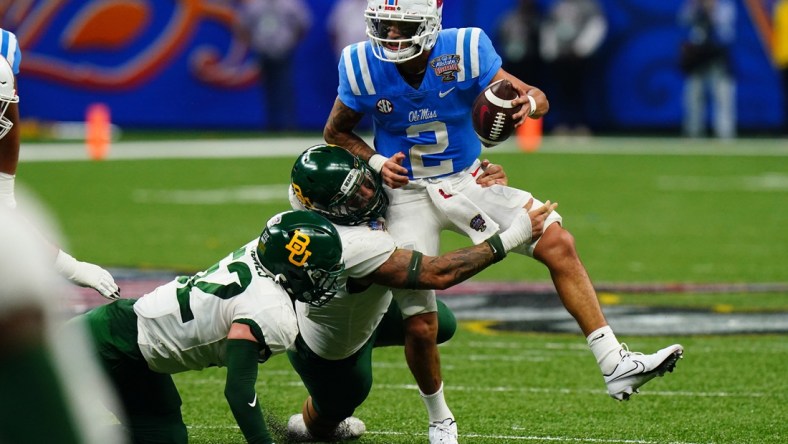 Jan 1, 2022; New Orleans, LA, USA; Baylor Bears defensive tackle Cole Maxwell (96) sacks Mississippi Rebels quarterback Matt Corral (2) during the first half in the 2022 Sugar Bowl at Caesars Superdome. Mandatory Credit: John David Mercer-USA TODAY Sports