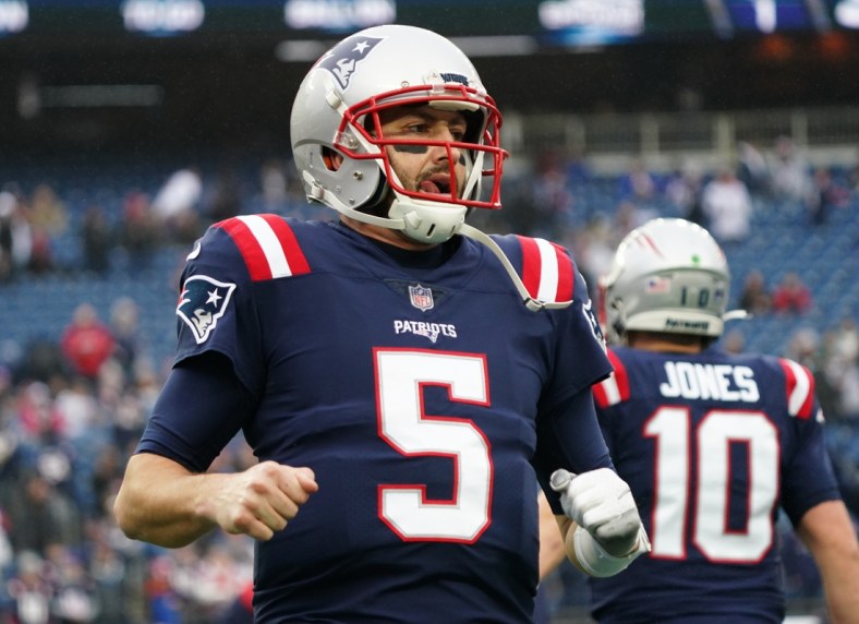 Jan 2, 2022; Foxborough, Massachusetts, USA; New England Patriots quarterback Brian Hoyer (5) warms up before the start of a game against the Jacksonville Jaguars at Gillette Stadium. Mandatory Credit: David Butler II-USA TODAY Sports