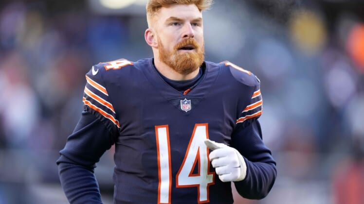 Jan 2, 2022; Chicago, Illinois, USA; Chicago Bears quarterback Andy Dalton (14) reacts after the game against the New York Giants during the second half at Soldier Field. Mandatory Credit: Mike Dinovo-USA TODAY Sports