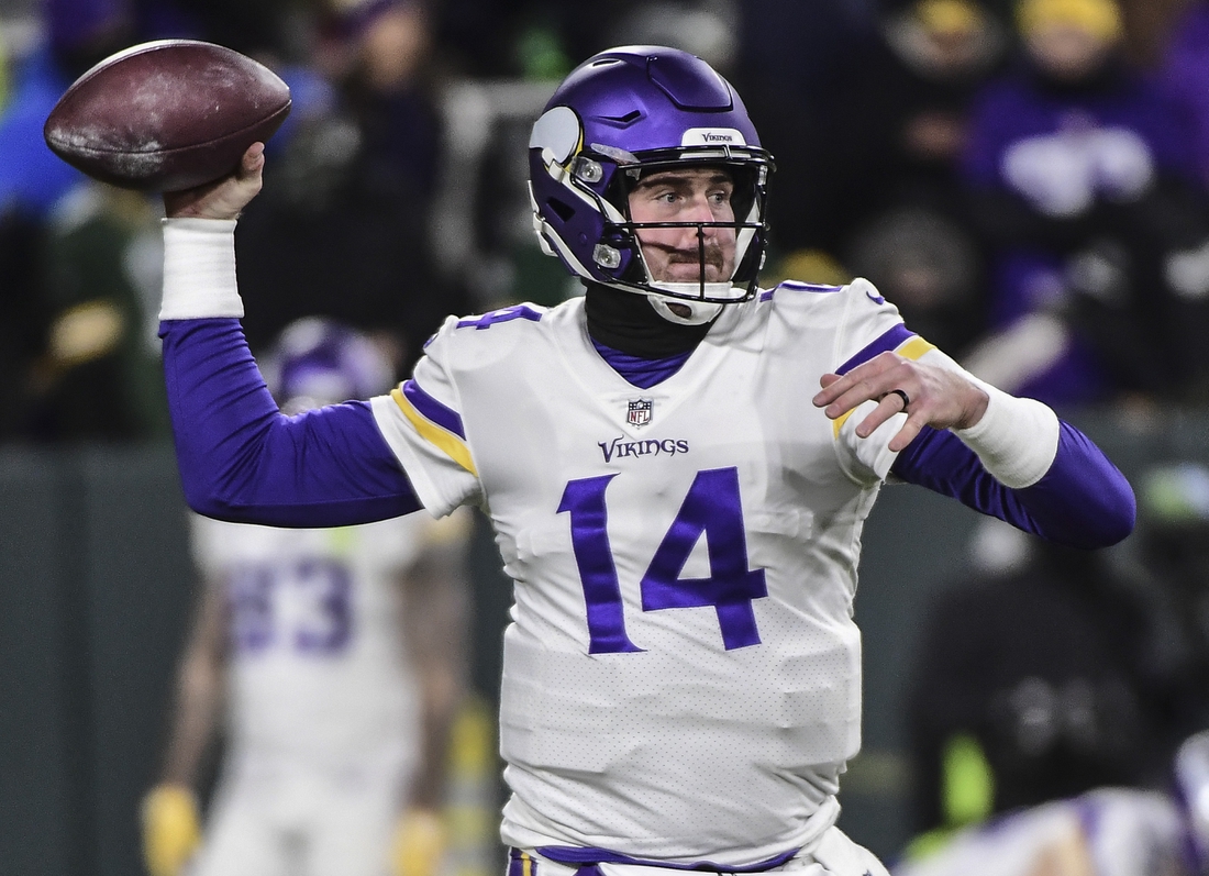 Jan 2, 2022; Green Bay, Wisconsin, USA; Minnesota Vikings quarterback Sean Mannion (14) warms up before game against the Green Bay Packers at Lambeau Field. Mandatory Credit: Benny Sieu-USA TODAY Sports