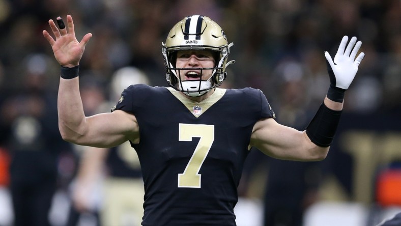 Jan 2, 2022; New Orleans, Louisiana, USA; New Orleans Saints quarterback Taysom Hill (7) gestures as he calls a play in the first quarter against the Carolina Panthers at the Caesars Superdome. Mandatory Credit: Chuck Cook-USA TODAY Sports