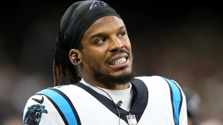 Jan 2, 2022; New Orleans, Louisiana, USA; Carolina Panthers quarterback Cam Newton (1) on the sidelines in the second quarter against the New Orleans Saints at the Caesars Superdome. Mandatory Credit: Chuck Cook-USA TODAY Sports