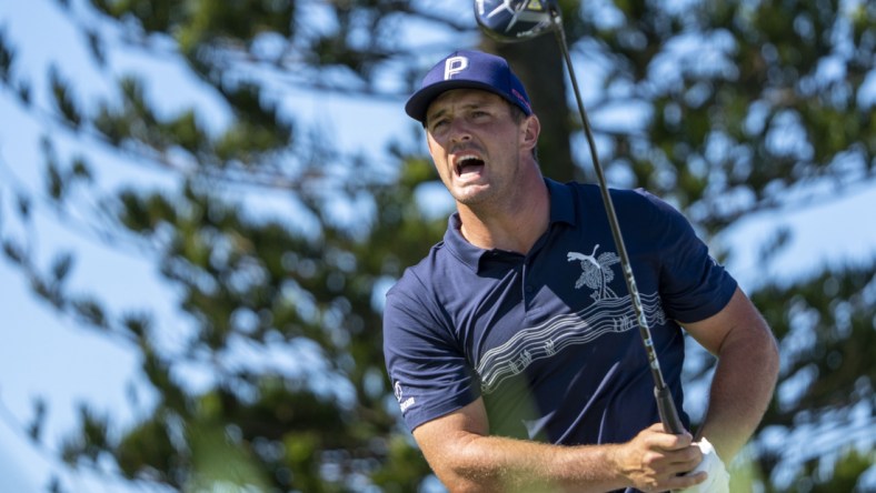 January 7, 2022; Maui, Hawaii, USA; Bryson DeChambeau hits his tee shot on the third hole during the second round of the Sentry Tournament of Champions golf tournament at Kapalua Resort - The Plantation Course. Mandatory Credit: Kyle Terada-USA TODAY Sports