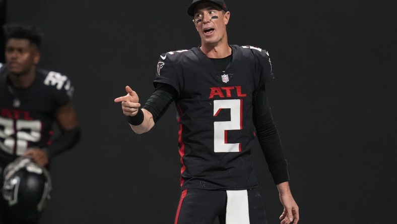 Jan 9, 2022; Atlanta, Georgia, USA; Atlanta Falcons quarterback Matt Ryan (2) reacts with New Orleans Saints defensive end Cameron Jordan (94) (not shown) on the field after the game at Mercedes-Benz Stadium. Mandatory Credit: Dale Zanine-USA TODAY Sports