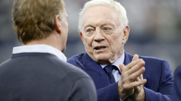 Jan 16, 2022; Arlington, Texas, USA; Dallas Cowboys owner Jerry Jones talks (R) with NFL Commissioner Roger Goodell (L) before the game against the San Francisco 49ers in a NFC Wild Card playoff football game at AT&T Stadium. Mandatory Credit: Tim Heitman-USA TODAY Sports