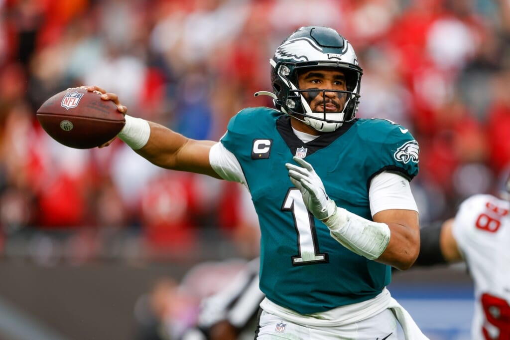 Jan 16, 2022; Tampa, Florida, USA; Philadelphia Eagles quarterback Jalen Hurts (1) looks to pass the ball in the second half against the Tampa Bay Buccaneers in a NFC Wild Card playoff football game at Raymond James Stadium. Mandatory Credit: Nathan Ray Seebeck-USA TODAY Sports