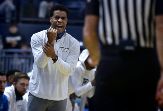 Rams coach David Cox tries to get the attention of a referee after what he thinks was a missed call in the first half.