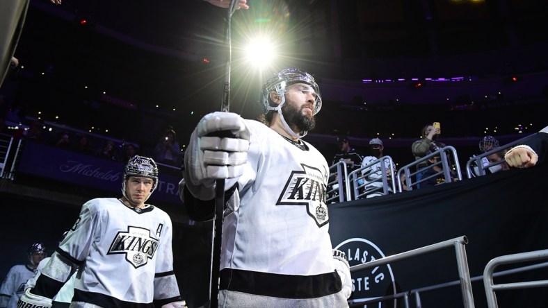 Jan 20, 2022; Los Angeles, California, USA; Los Angeles Kings defenseman Drew Doughty (8) and right wing Dustin Brown (23) before playing against the Colorado Avalanche in the third period at Crypto.com Arena. Mandatory Credit: Gary A. Vasquez-USA TODAY Sports